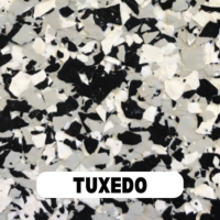 Tuxedo epoxy flake blend sample with black, white, and gray chips