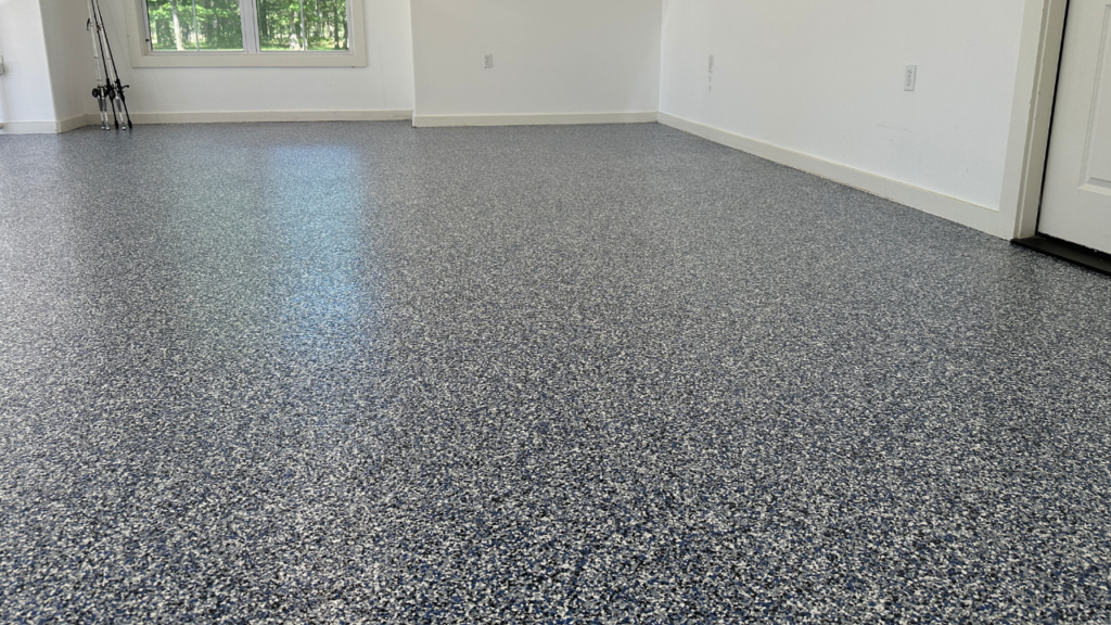 Garage floor concrete coating finished using polyaspartic. 