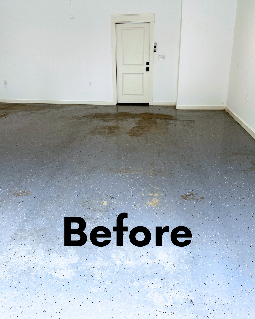 Damaged and stained garage floor with faded coating