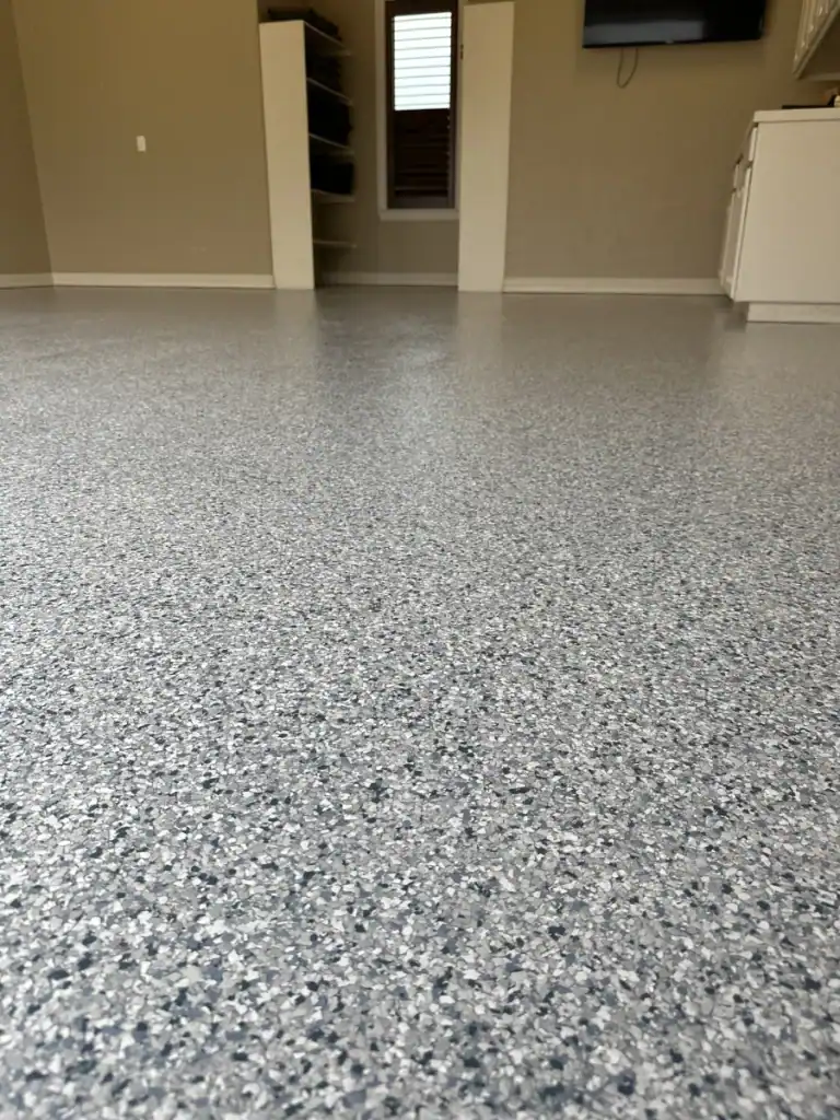Durable epoxy flooring system in residential residential, multi-use space.