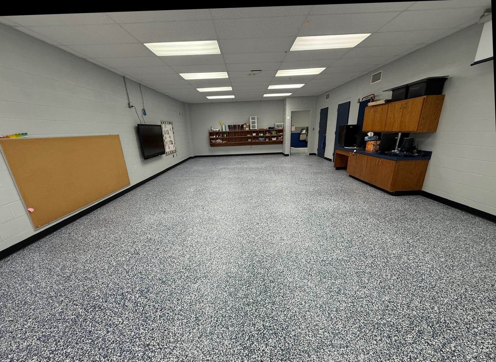 Epoxy coated commercial flooring in a spacious room.