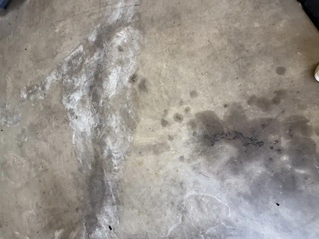 Existing concrete condition before garage floor preparation in Hideaway, Texas