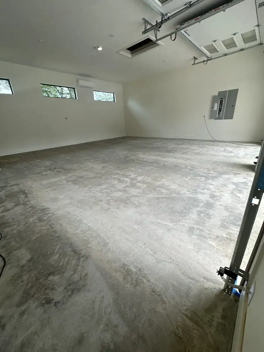 Prepared concrete floor in the large new-construction garage before the coating system was installed.
